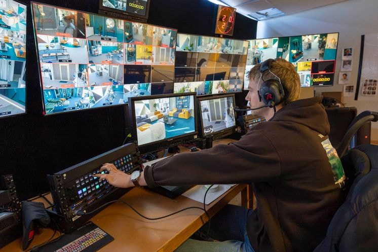 Metronome Control Room Tech pressing Buttons
